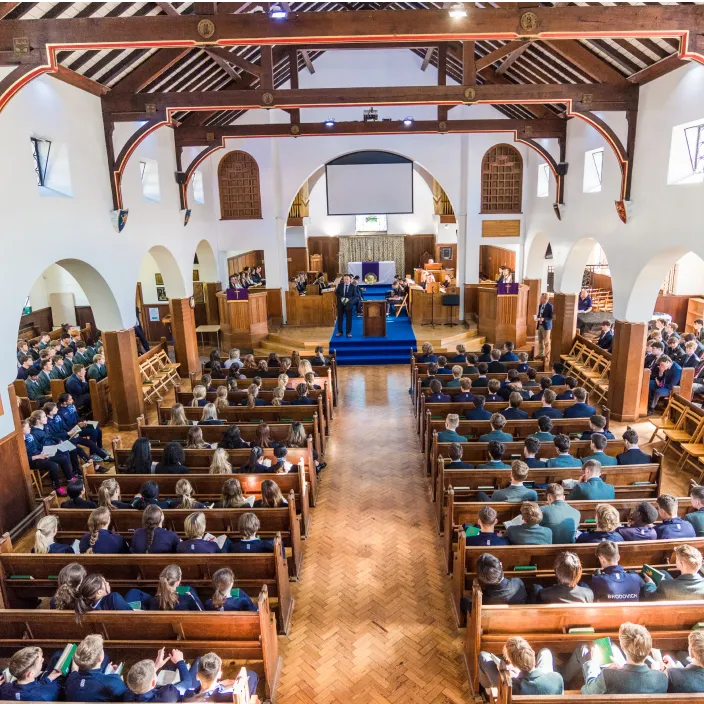The chapel filled with students